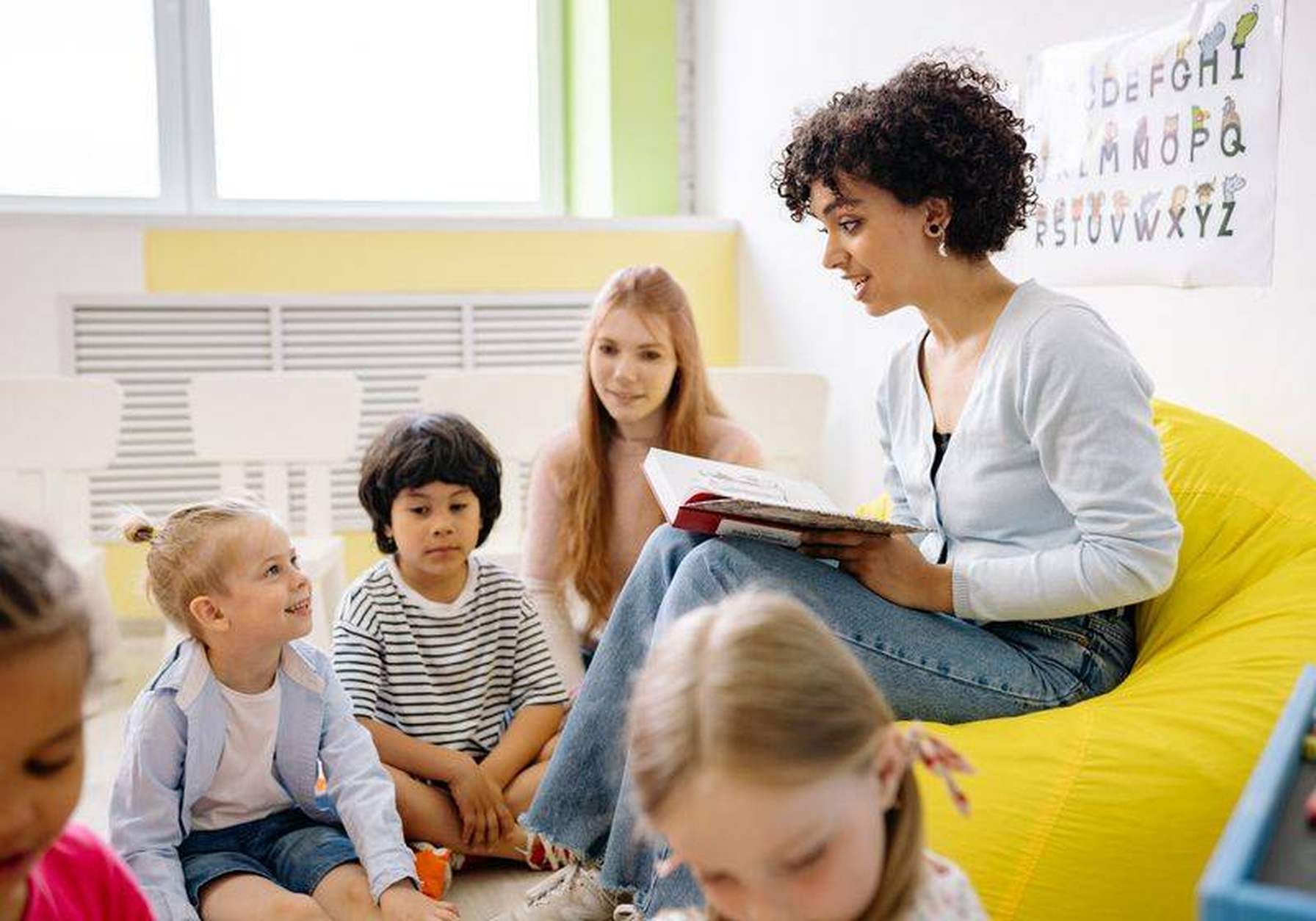 Montessori classroom with children and learning materials